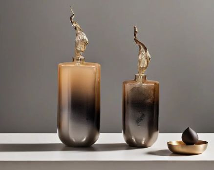 The modern decorative bottle features a champagne & leopard bronze mercury lustre glass with an ornamental antique gold plated aluminium lid. 1bottle large  2 bottle small