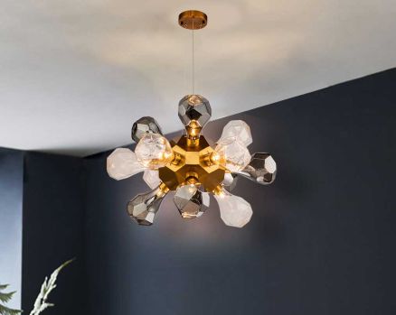 Showcasing a striking silhouette sparked by the space race, this sputnik chandelier brings a splash of industrial glam style commanding attention in any space
