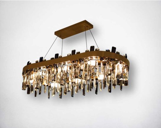 Art deco chandelier with copper crystal prism fringe adorned with champagne gold metal band evokes the boldness and glamour of the era.