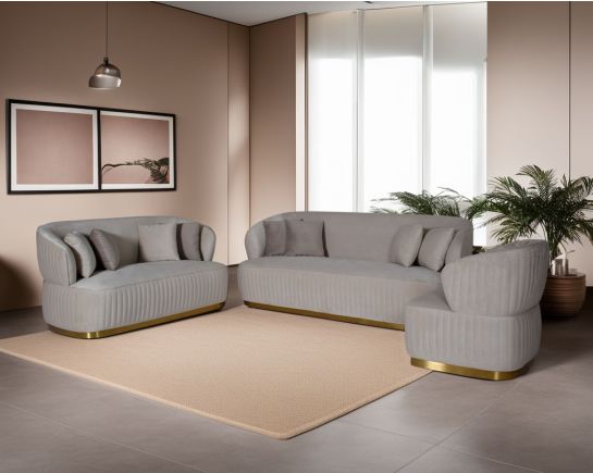 This 3+2+1 sofa set is an elegant statement piece with clean lines softened by subtle curves. Vertical channel quilting is an outstanding design detail on this sofa.