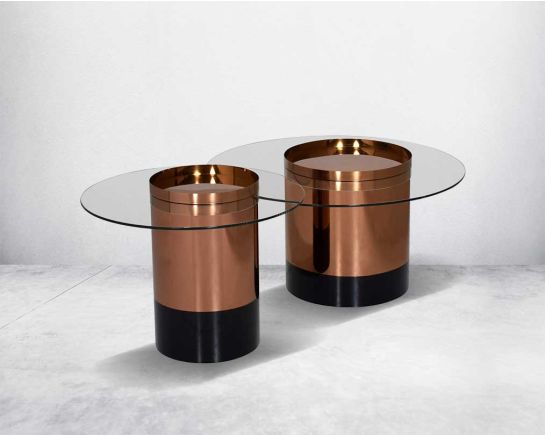 Glamorous and luxurious lair of ultra-modern minimalism this circular coffee and end table comes with clear tempered glass with stainless steel cylindrical base in matt rose gold & the base encased in a black glossy finish.