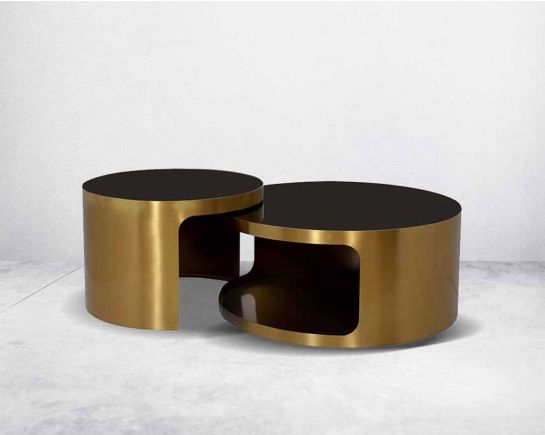 This swanky round black tempered glass coffee & end table set with a stainless steel matt gold