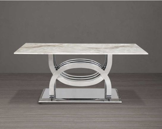 6 seater rectangular dining table with marble top comes with an artful stainless steel base.