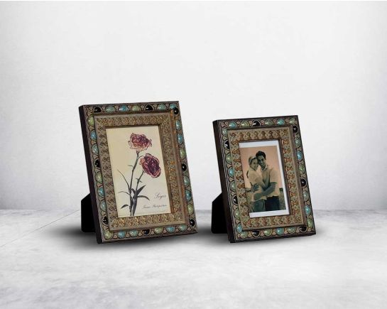 Photo frame in wood with stone embellished decorative frame in modern classic design.