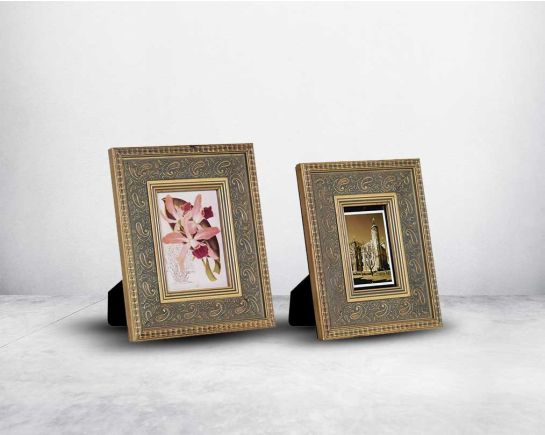 Photo frame in wood with decorative border in classic design. 1large 2 small