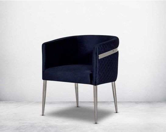 Accent leisure armchair upholstered & quilted in luxurious velvet fabric with high polished stainless steel frame and legs.
