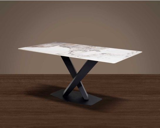This 6-seater minimalist dining table with marble top dining table has a metal cross base in a black matt finish.