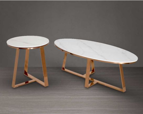 This set of coffee & end table is a captivating composition of a round end and oval coffee table which comes with glossy white sintered top & geometrical stainless steel base finished in glossy rose gold in a sleek rich contemporary design.