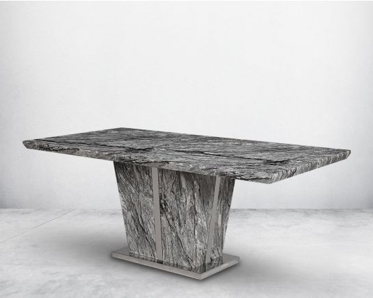 The 8 seaters Rectangular Dining Table with marble top and base in a glossy finish with stainless steel trims at the sides.