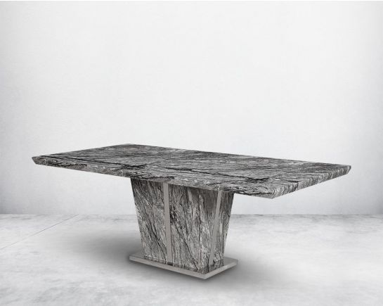 The 6 seaters Rectangular Dining Table with marble top and base in a glossy finish with stainless steel trims at the sides.
