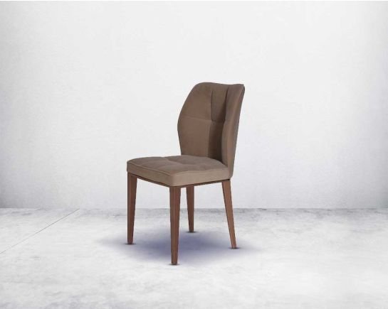Dining chair upholstered in velvet fabric with high polished rose gold stainless steel legs.