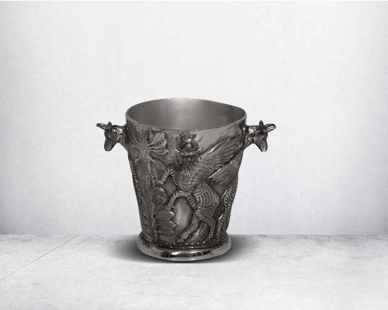 This flawless bullhead champagne/wine chiller is an impeccable statement in any bar area or living space.