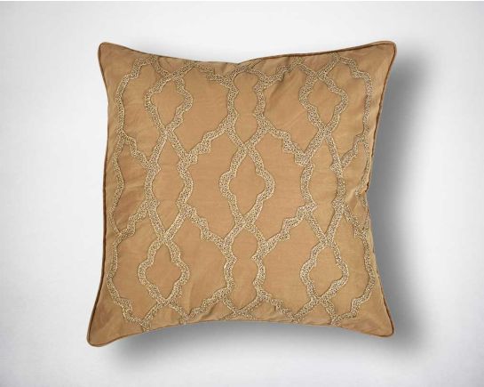 Gold poly silk embroidered cushion.