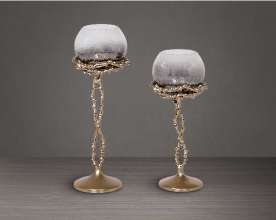 Pillar goblet candle holder in textured black & grey luster glass with gold finished aluminum decorative base.