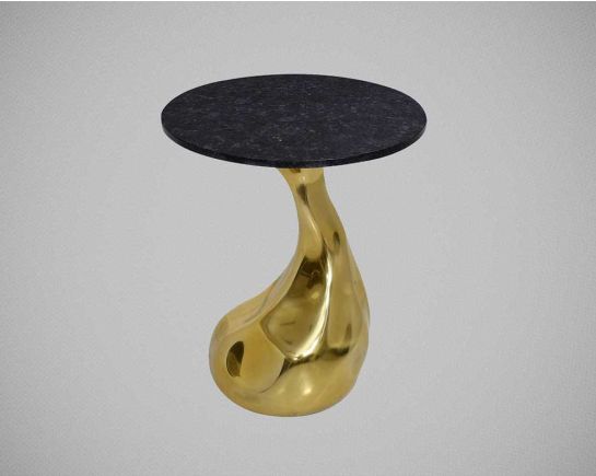 The artful gold accent end table comes with a circular black granite top with an amorphously shaped high polished gold pedestal.