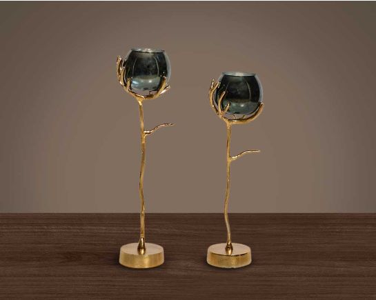 Goblet glass votive t-lite holder in textured moss luster glass with gold finished aluminum decorative base.