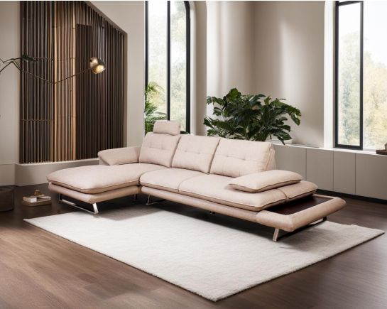Left and right-aligned 3 seater + chaise L shape  sofa upholstered in fabric with moveable back and headrest and stainless steel base.