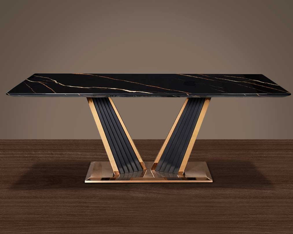 This glorious marble top dining table features a tree bark design motif finished in glossy rose gold plated stainless steel & black sandblasted base. It comfortably seats 8 people making an elegant & opulent style statement in any home.