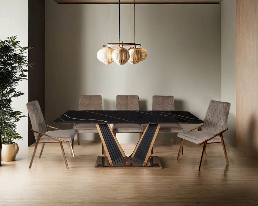 This glorious marble top dining table features a tree bark design motif finished in glossy rose gold plated stainless steel & black sandblasted base. Comfortable making an elegant look & opulent style statement in any home.
Dining chair upholstered in fa
