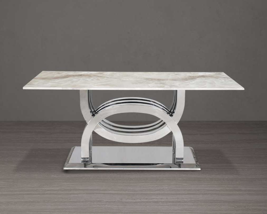 6 seater rectangular dining table with marble top comes with an artful stainless steel base.