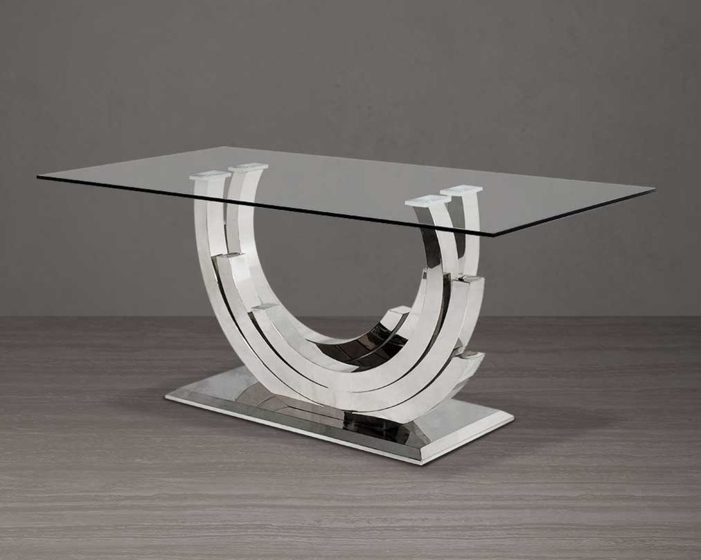 This 6 seater dining table with clear tempered glass top comes with an artful abstract stainless steel base The stainless steel base echoes an opulent and sophisticated modern style and stands out in any ambience.