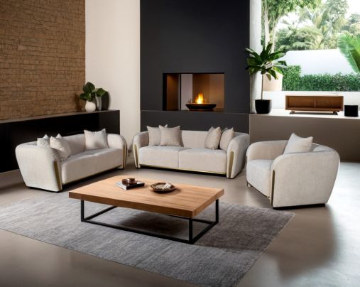 This 3+2+1 sofa set in high-quality fabric is an epitome of luxury, an astonishing piece of modern design. The sofa's gently curved back with its distinctive flared padded arms wrap the seat in a sweeping embrace.