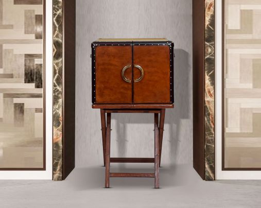 Bar cabinet in distressed cognac leather with a retro vintage look with brass hardware and wooden slats front view 